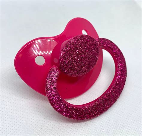 pink adult pacifier